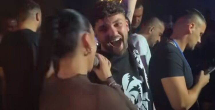 Kjo video po ‘çmend’ rrjetin, Olsi Bylyku shfaqet në koncert me Egli Takon? Ja e vërteta
